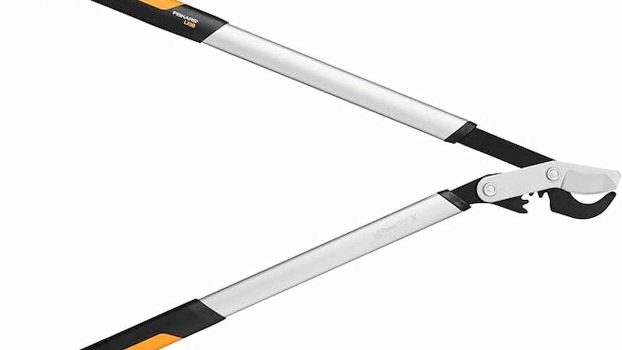 A pair of long-handled garden loppers with silver metal arms, black and orange grips, and a bypass cutting blade designed for pruning thick branches