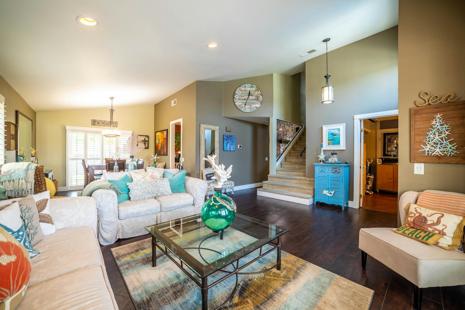 Inviting living room interior with contemporary design, plush sofas, and decorative accents.