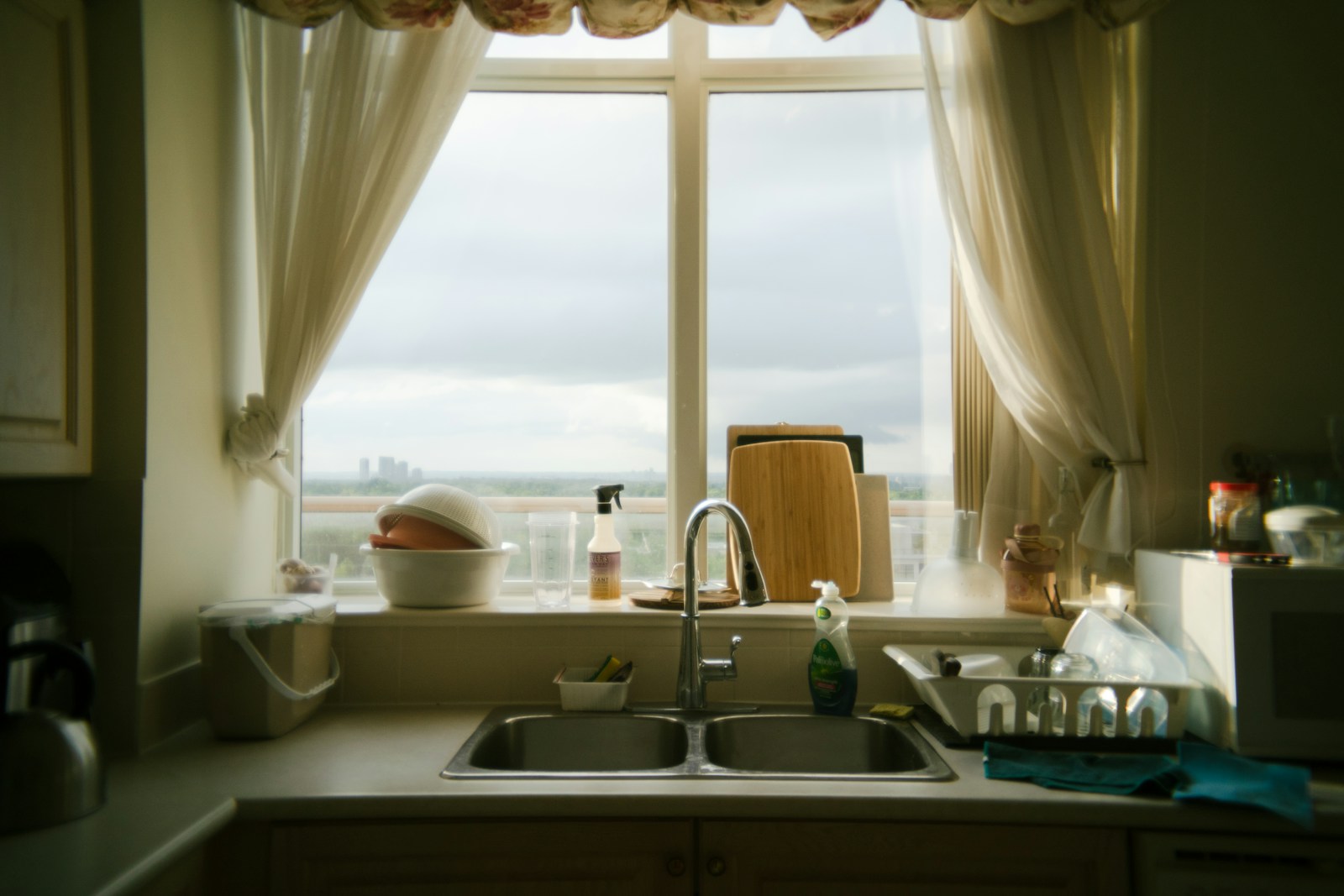 A kitchen with a sink and a window