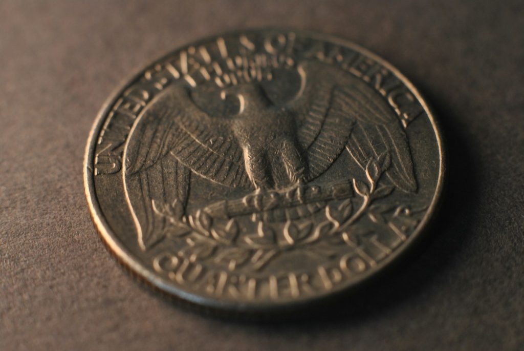 A close up of a coin on a table