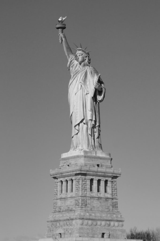 a black and white photo of the statue of liberty
