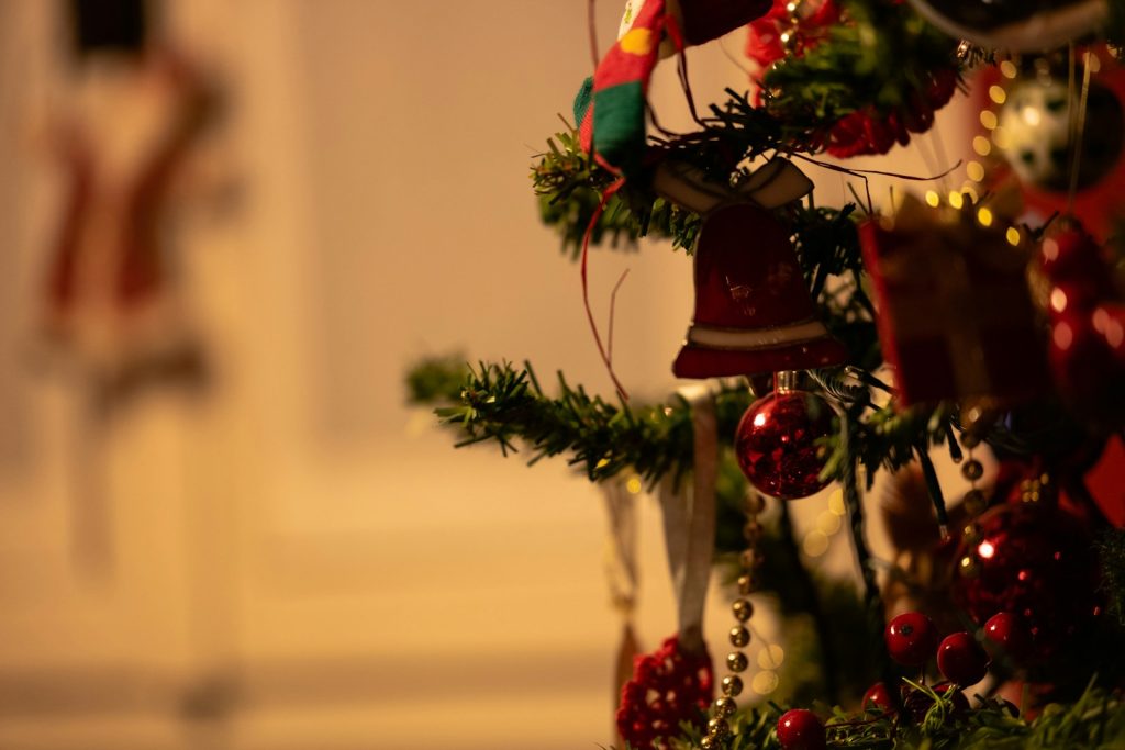 a close up of a christmas tree with ornaments