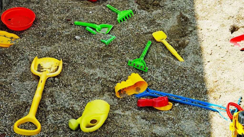 yellow and green plastic toy