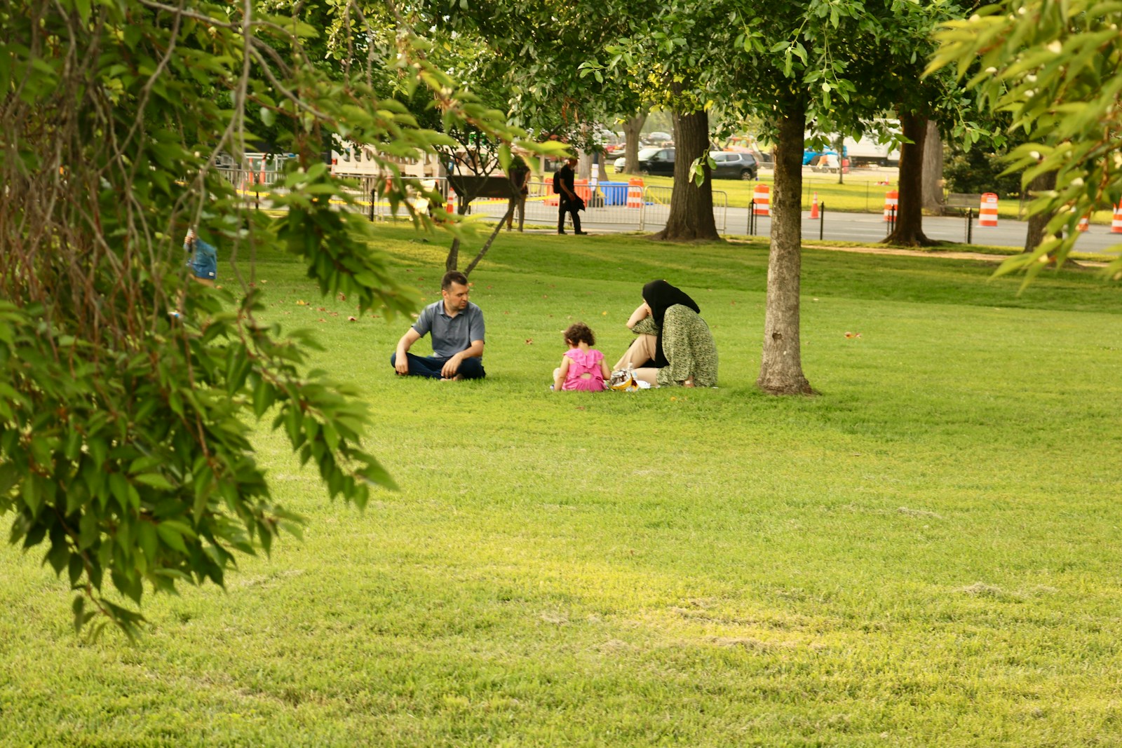 Family enjoys a relaxing day at the park.