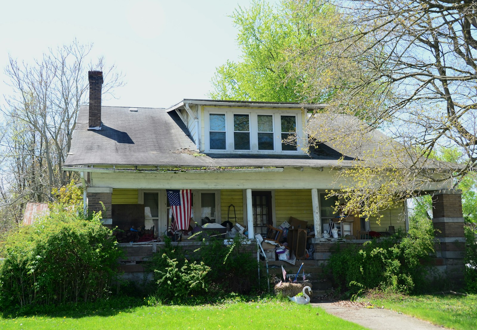 a house with a flag on the front of it