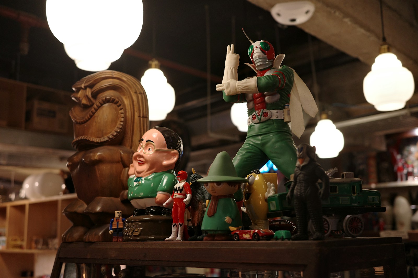 Collection of vintage toys and figurines displayed indoors