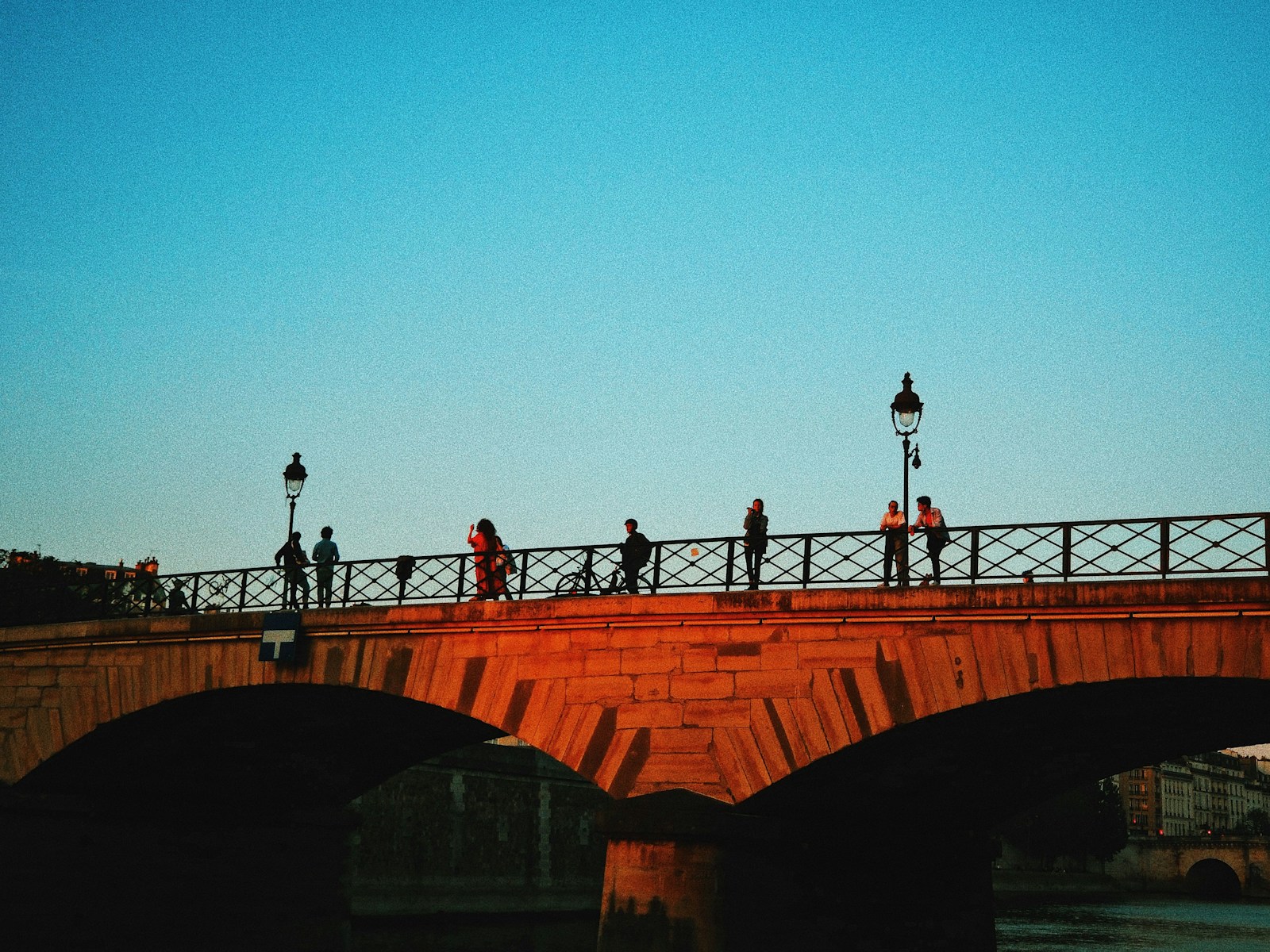 people walking on brown bridge during daytime