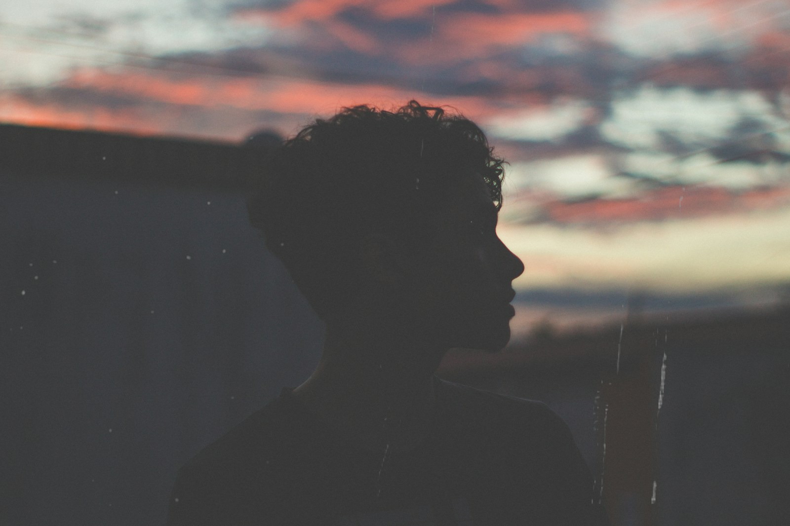silhouette of man during sunset