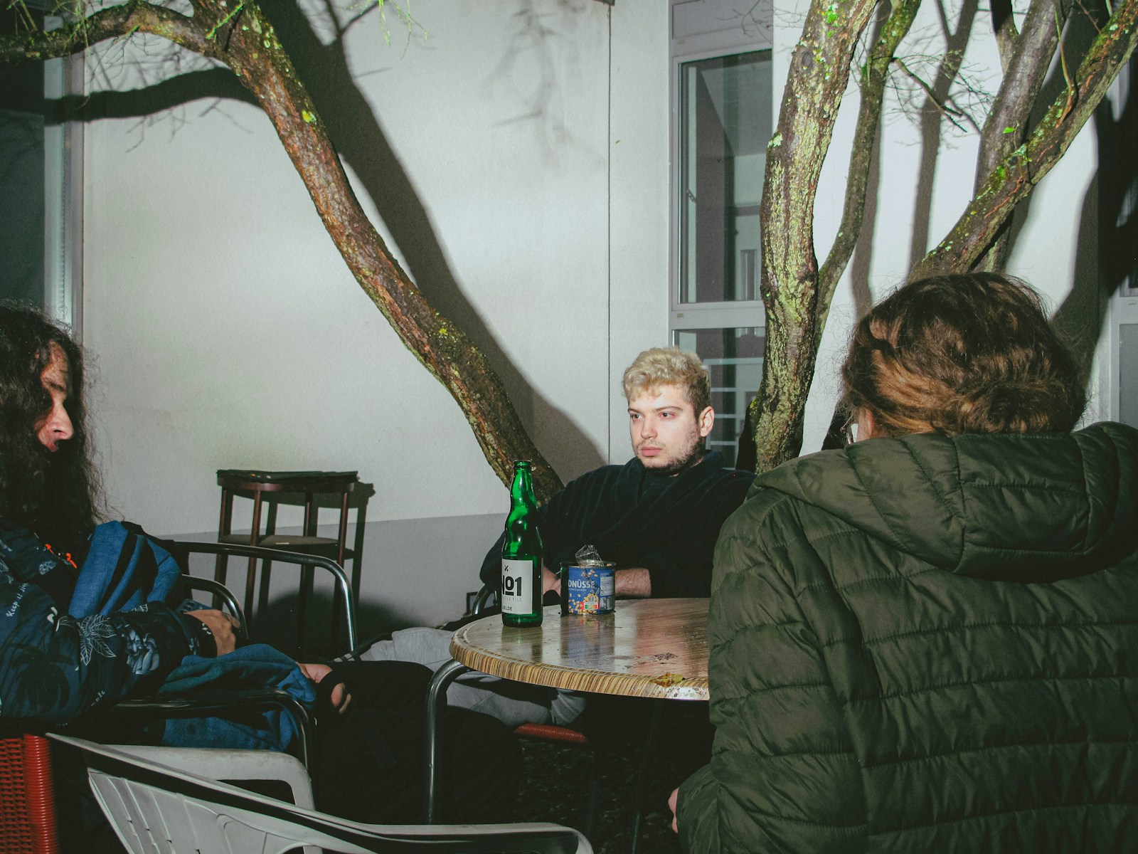 A group of people sitting around a table