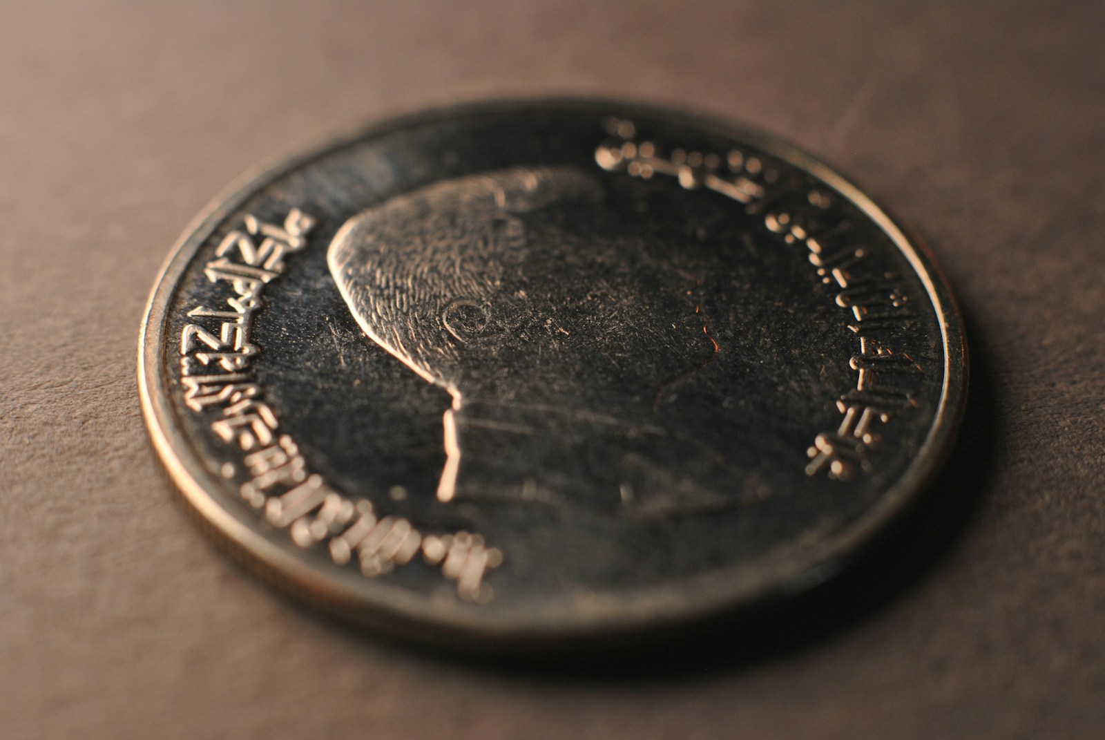 A close up of a coin on a table