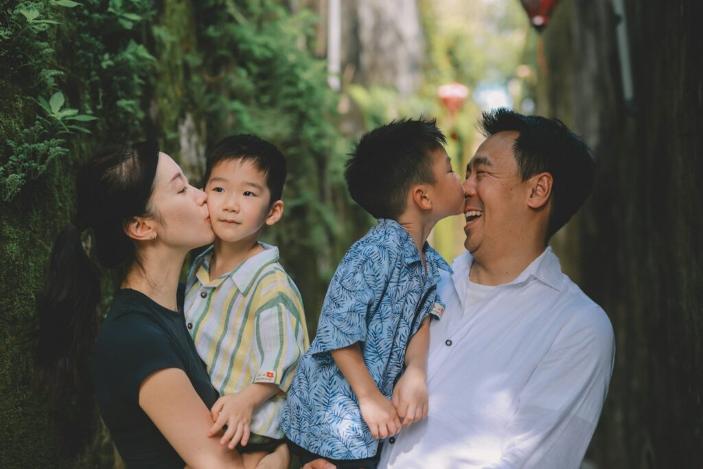 Family sharing a tender moment outdoors
