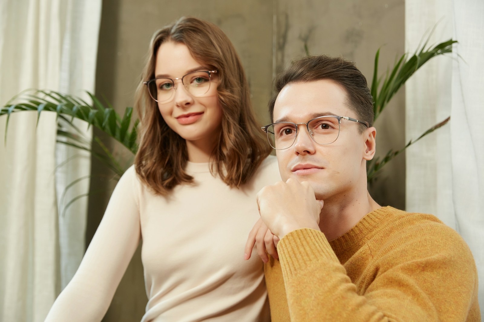 A man and a woman sitting next to each other