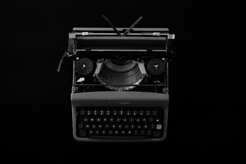 Vintage typewriter on a black background