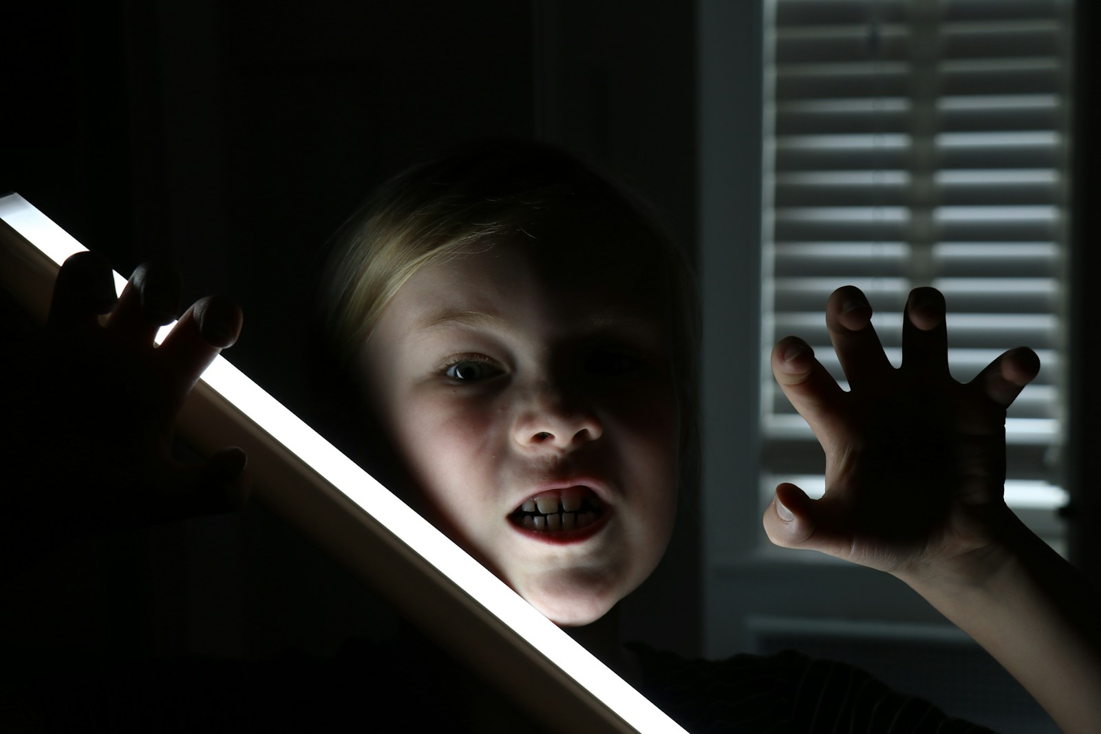 boy in black long sleeve shirt