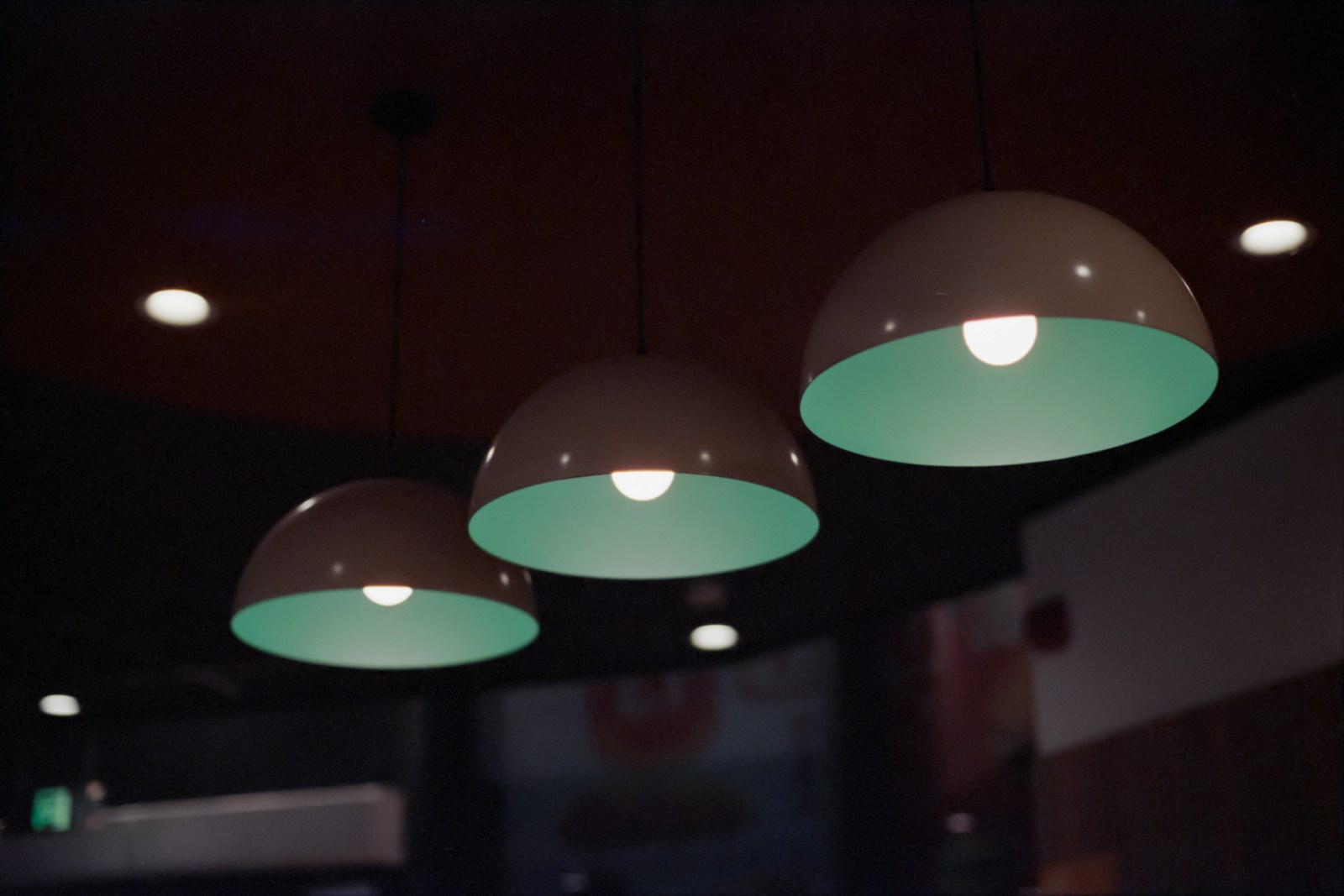 Three pendant lights hanging from the ceiling.