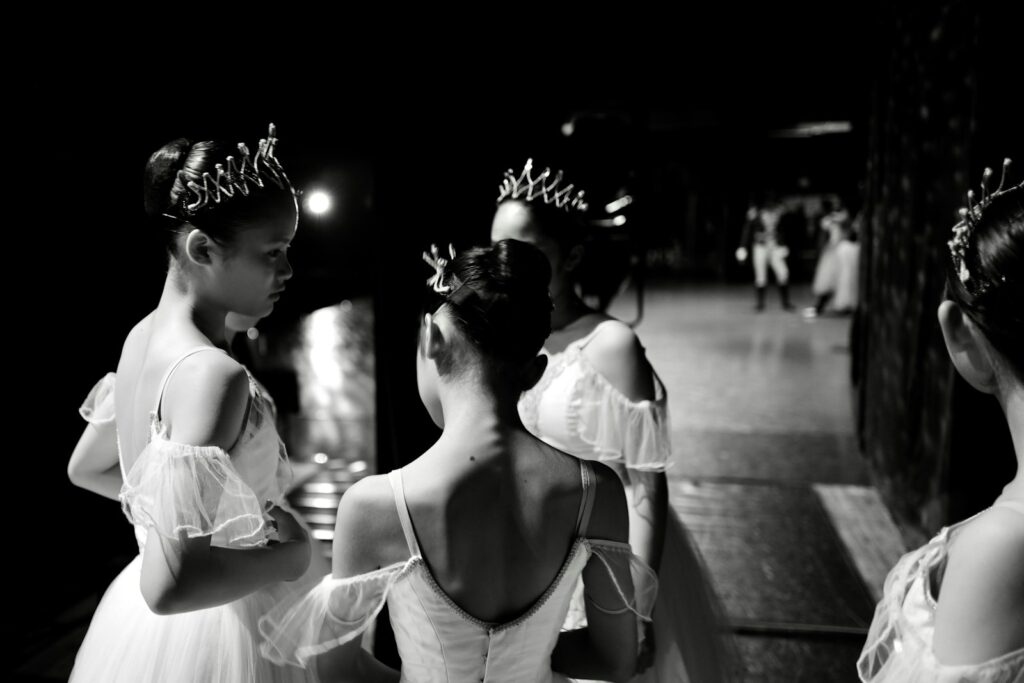 Young ballerinas in tutus backstage