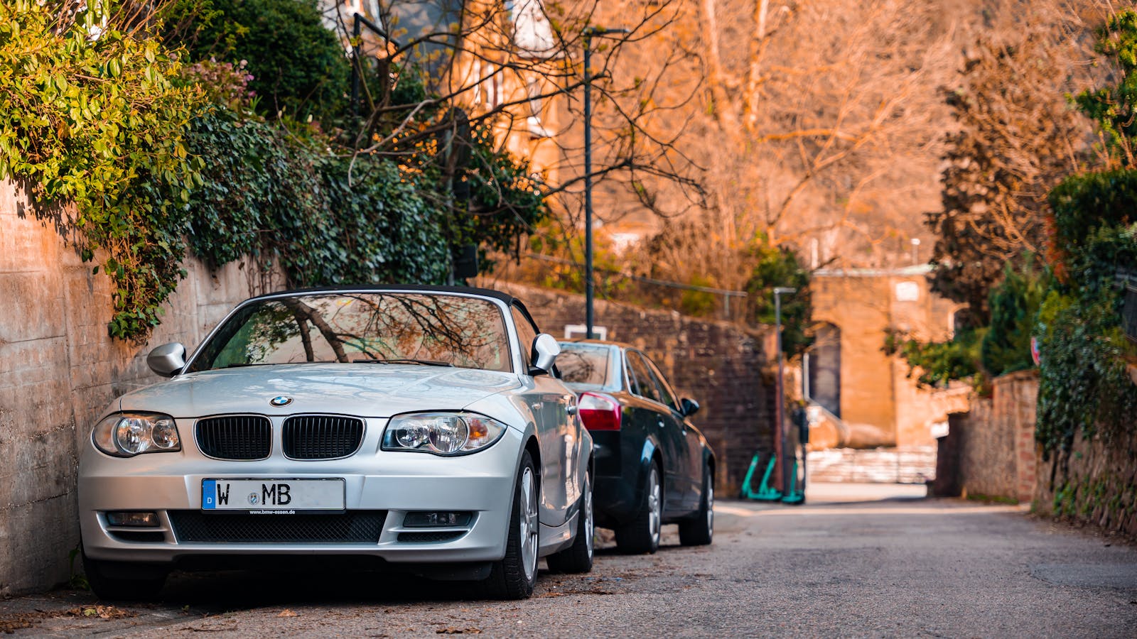 A BMW sports car parked on a picturesque street in Heidelberg, Germany.