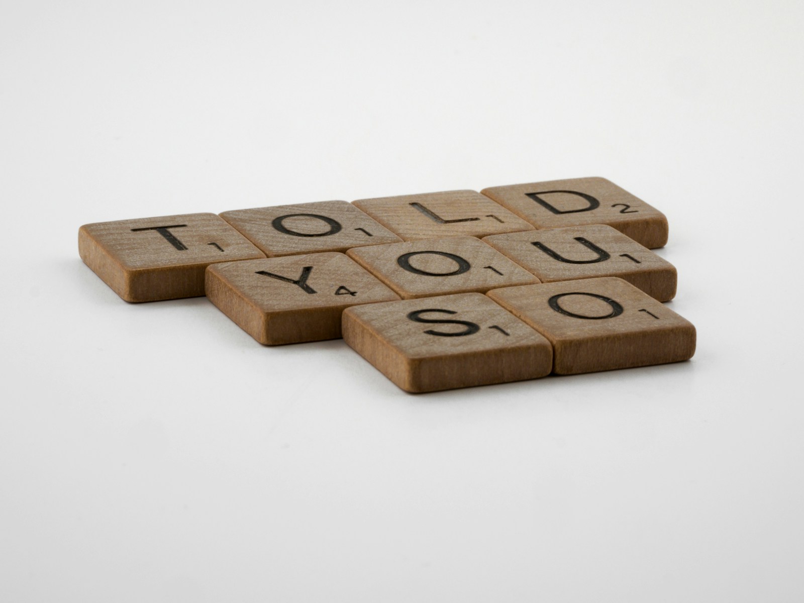 a group of wooden blocks spelling out the word today