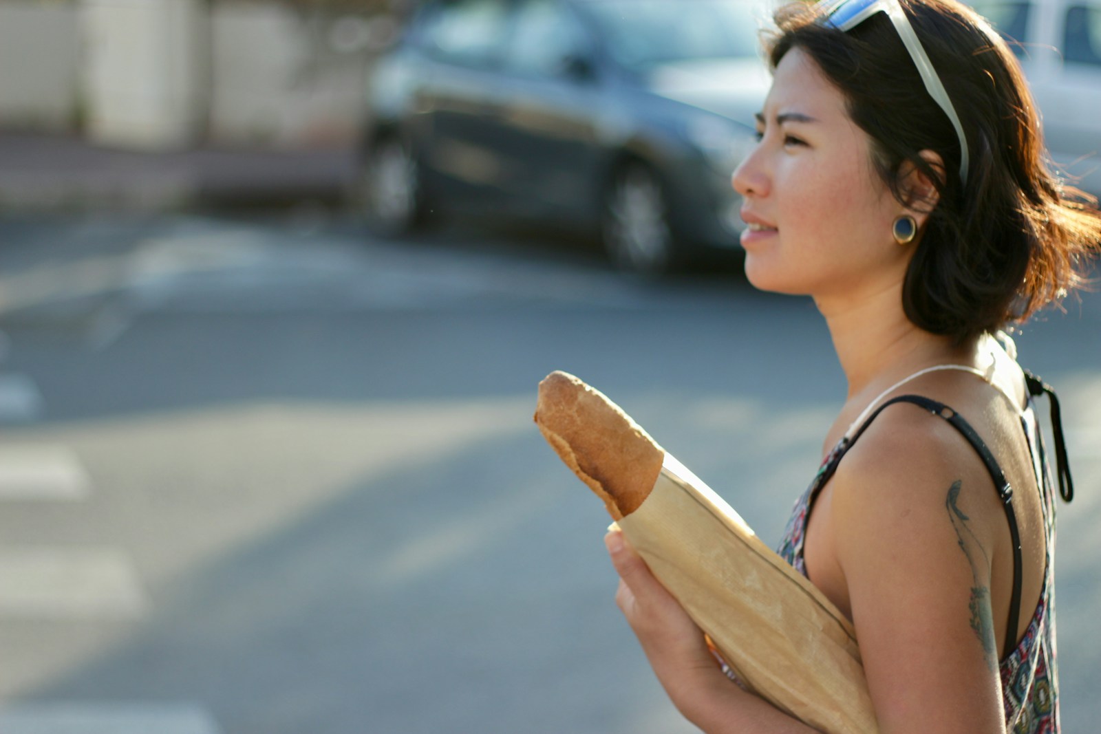 woman carrying bread