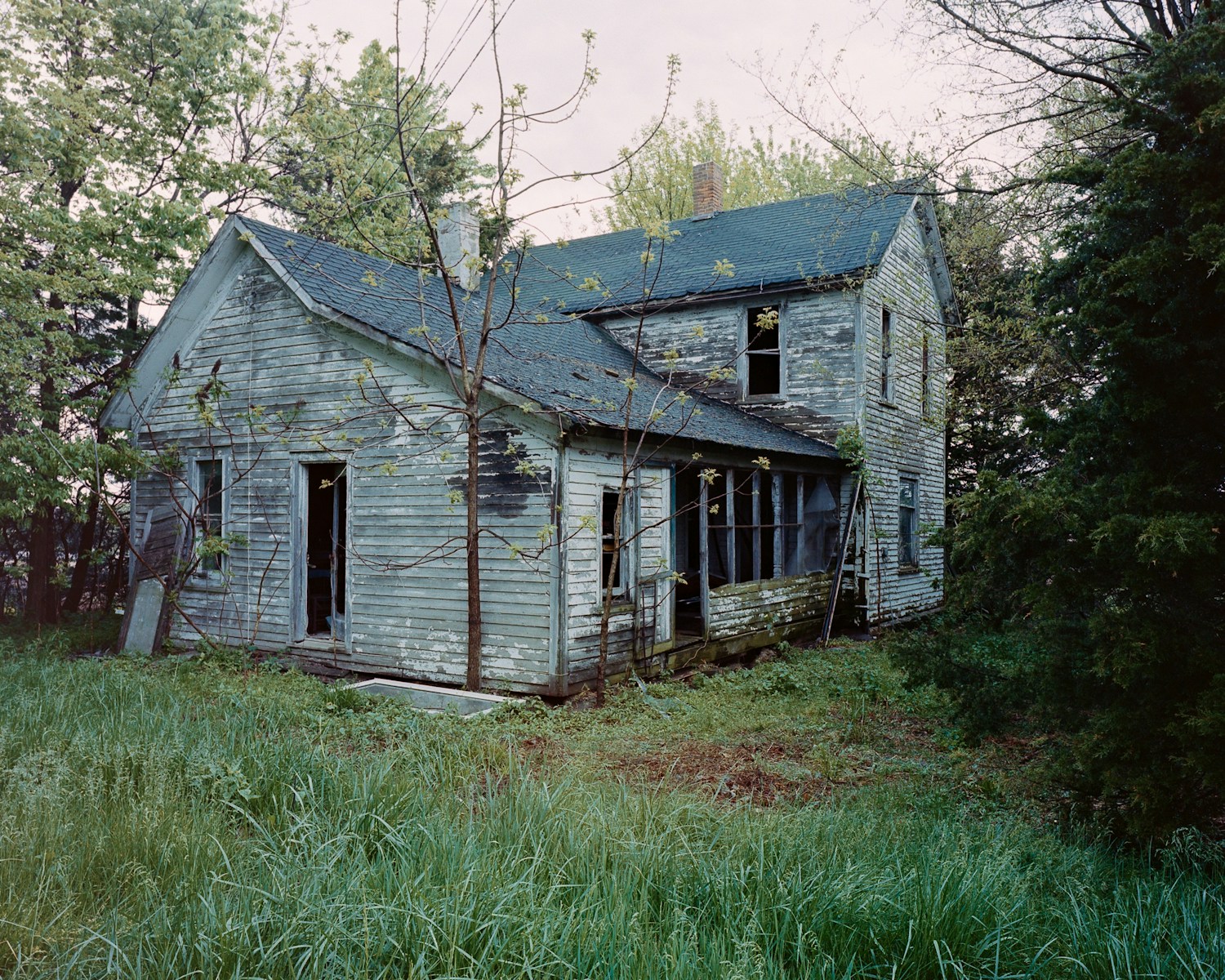 Abandoned House Attracts Squatters, Junk Cars, And Police, While The Only People Getting Weed Fines Are The Ones Living Next To The Mess
