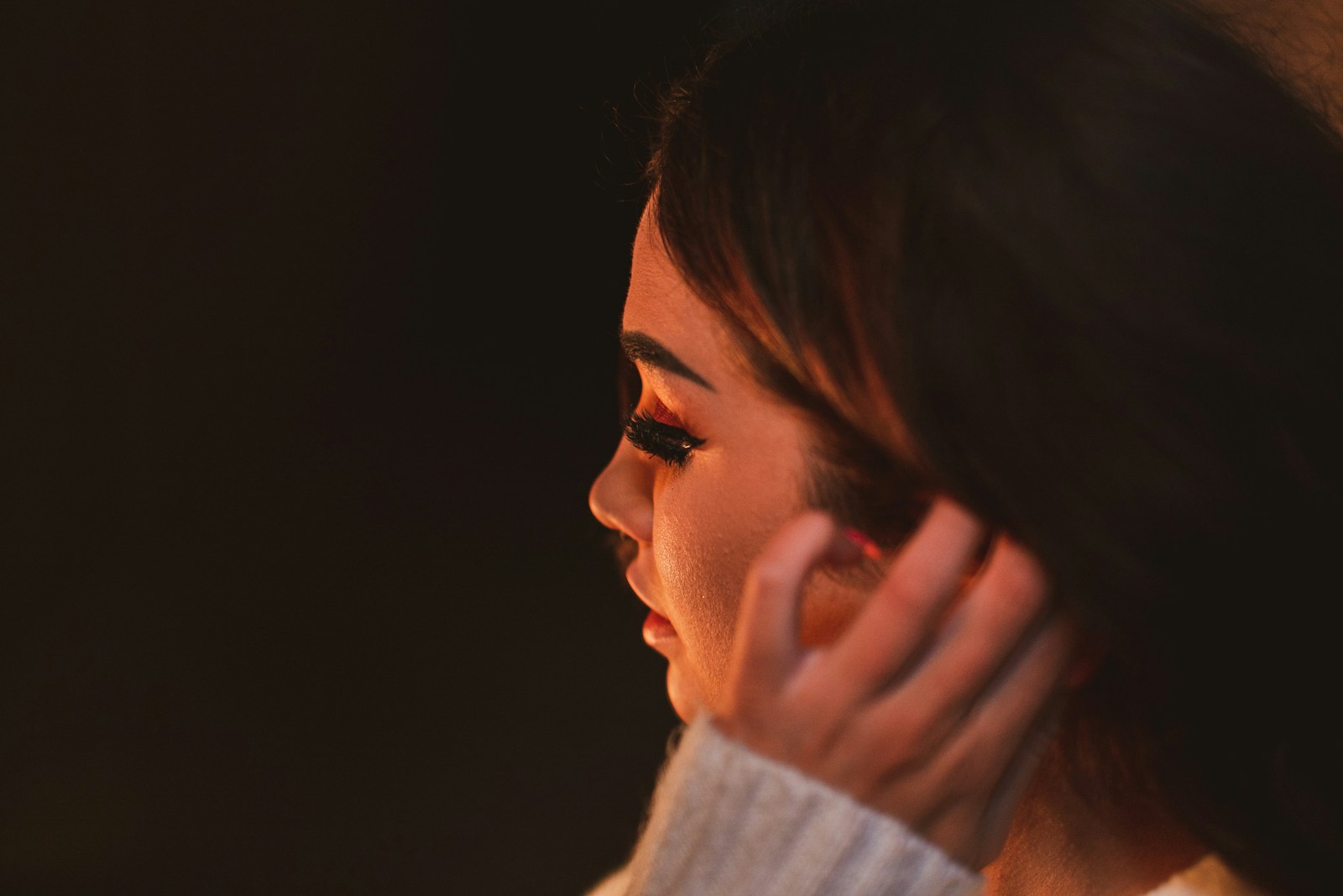 woman in white sweater