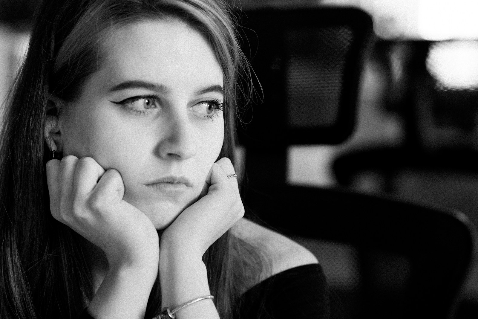 grayscale photo of woman in black shirt
