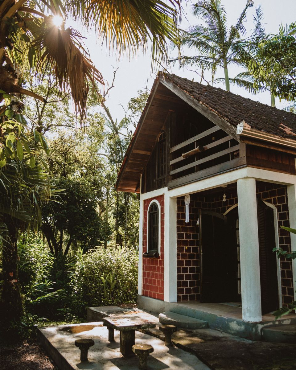 Brick house surrounded by lush greenery in Morretes, Brazil. Perfect for nature enthusiasts.