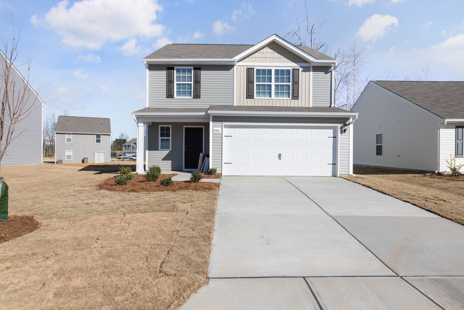 Spacious suburban family home with garage and landscaped garden.