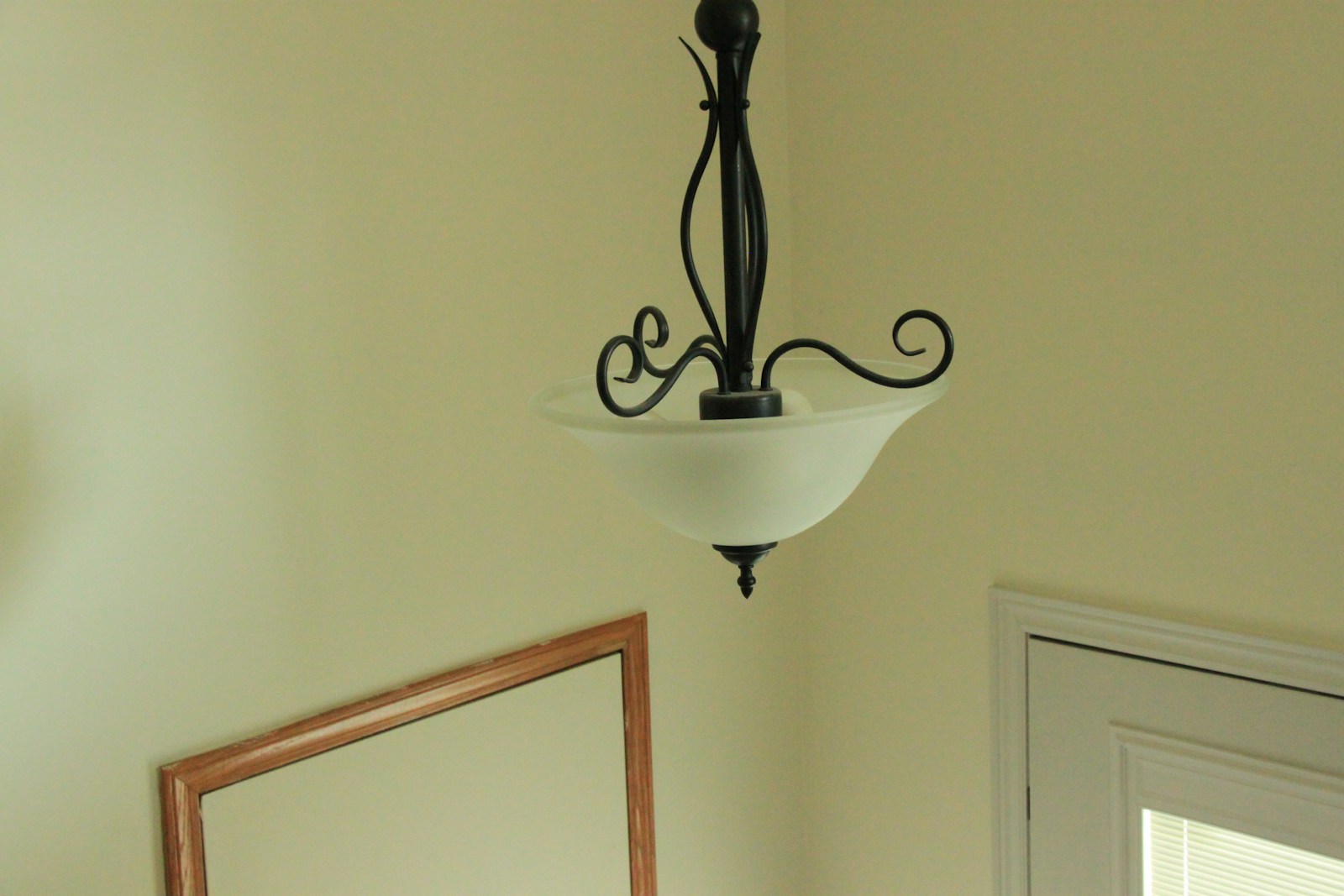a light fixture from a ceiling