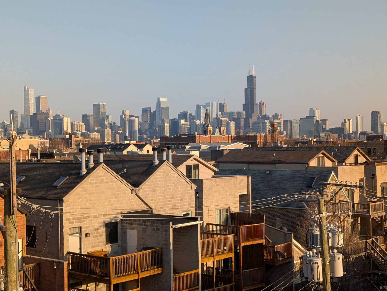 Stunning view of the Chicago skyline from a residential area during daytime.
