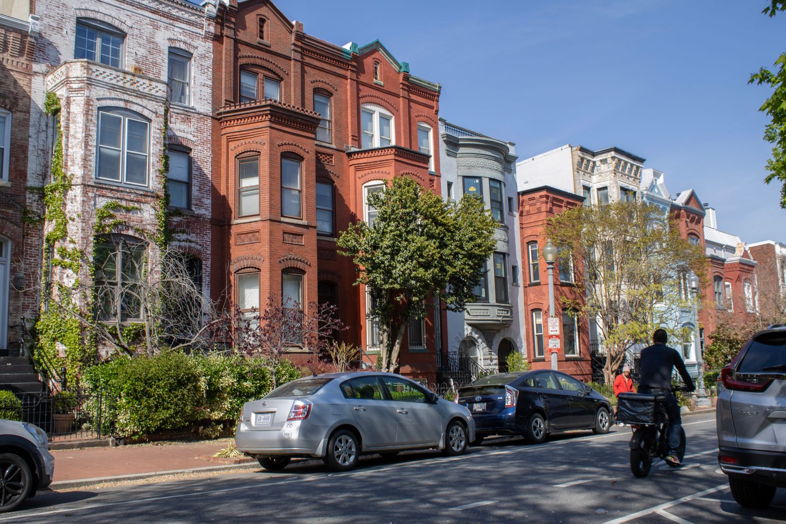 Beautiful brownstone row houses on a sunny street in Washington D.C.