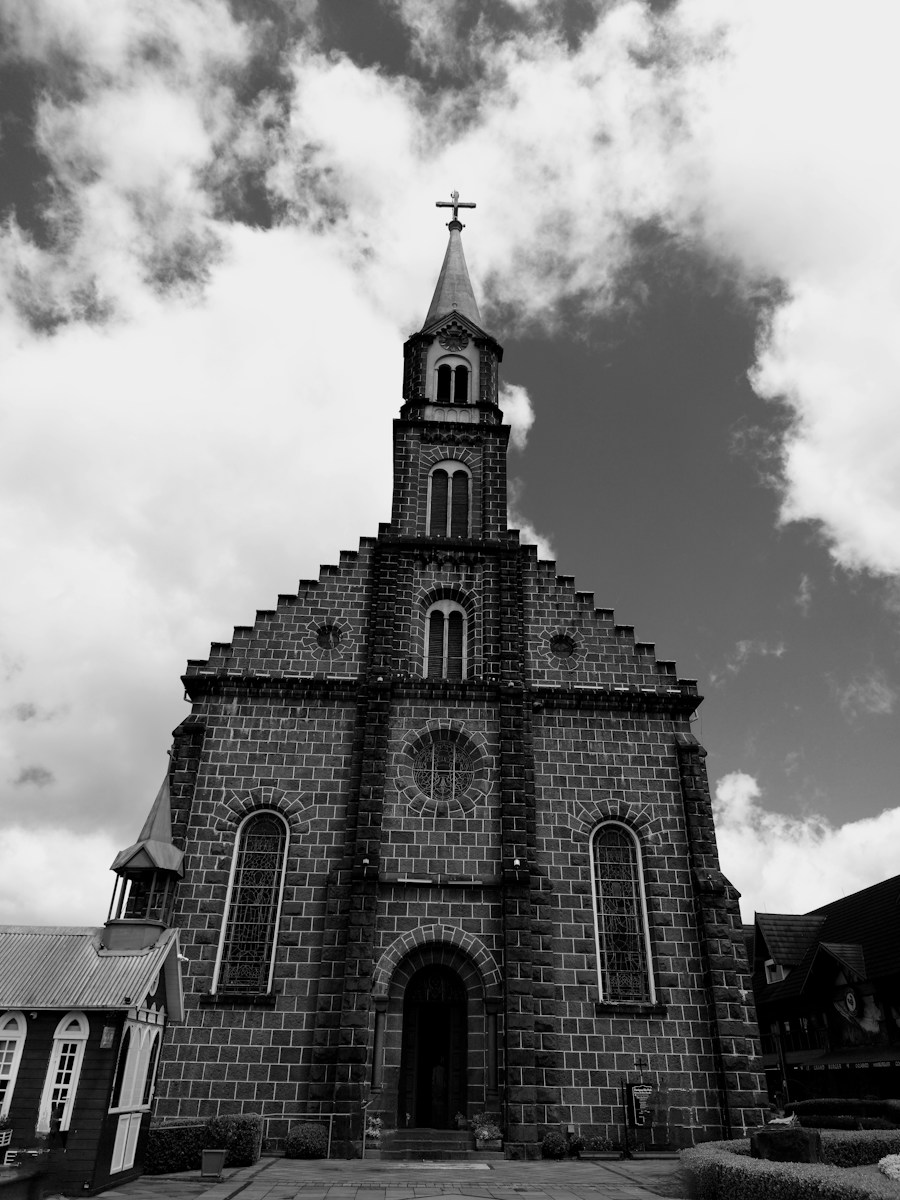 a black and white photo of a church