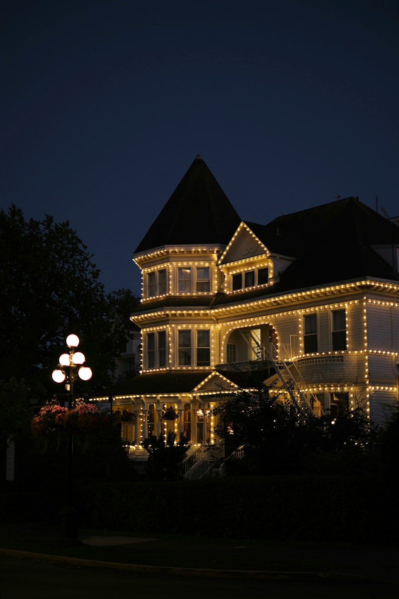 House adorned with lights at dusk
