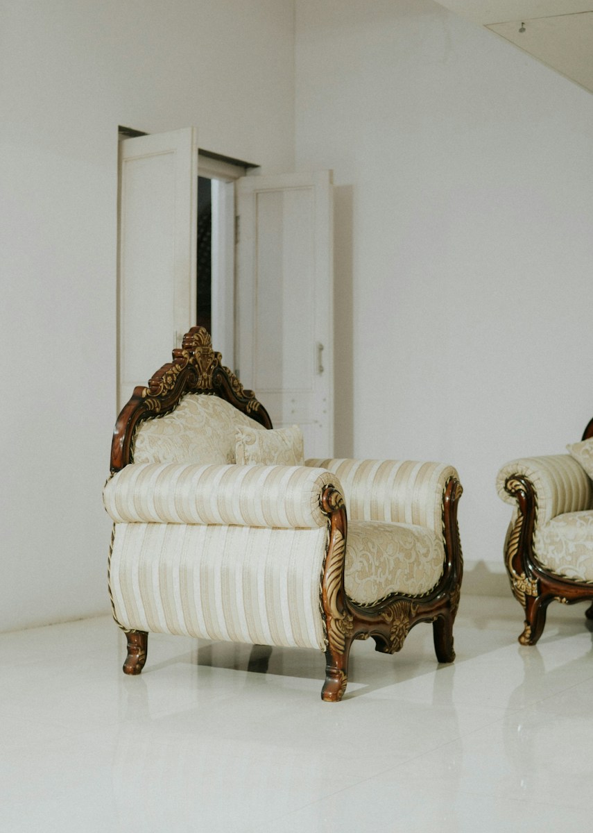 a white couch with a headboard