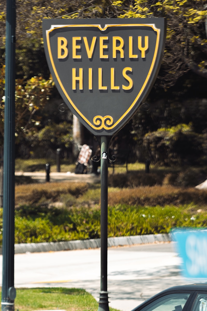 Beverly hills street sign with trees in background