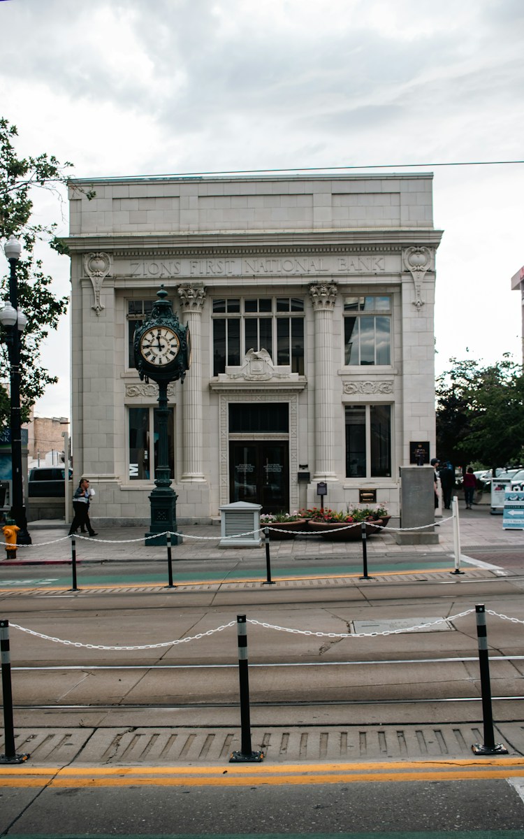 A large building with a clock on the front of it