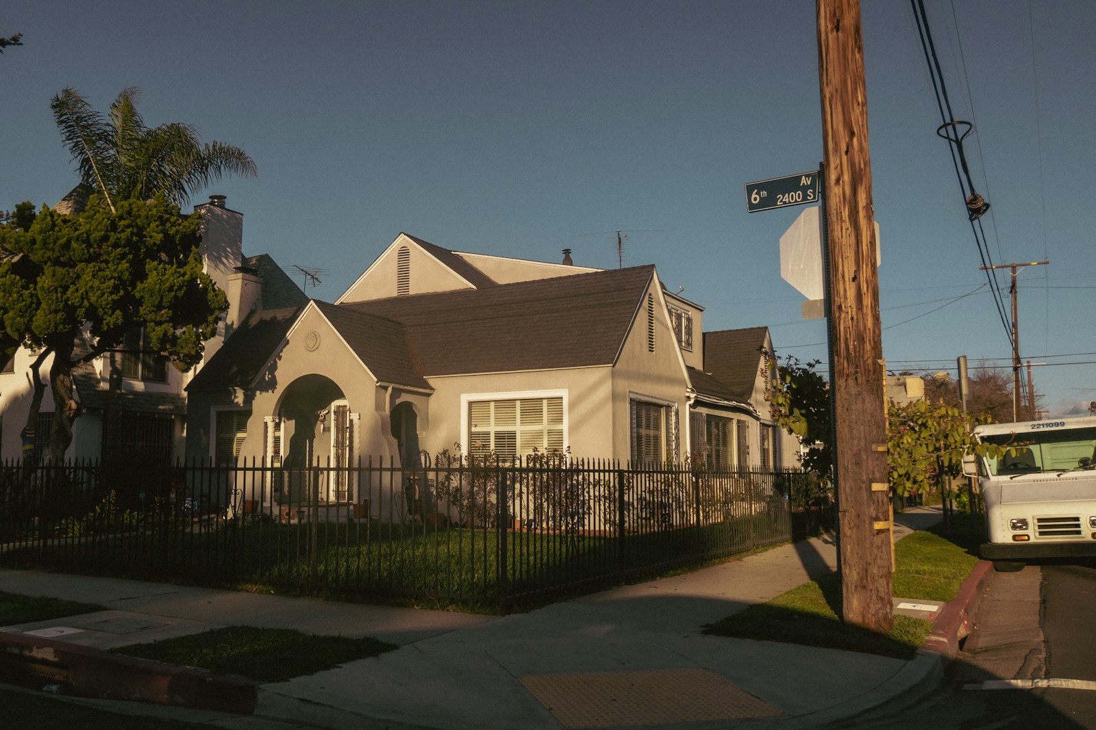 a house with a truck parked in front of it