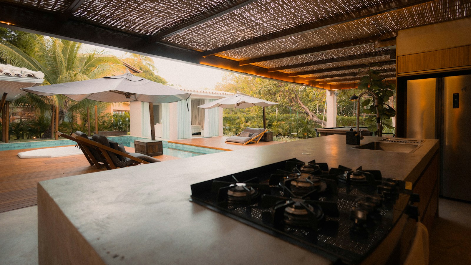 Modern outdoor kitchen and pool area