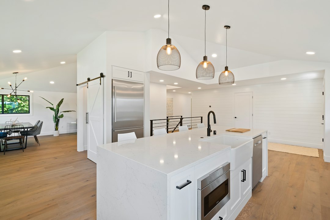 Kitchen island with pendant lighting after a remodel