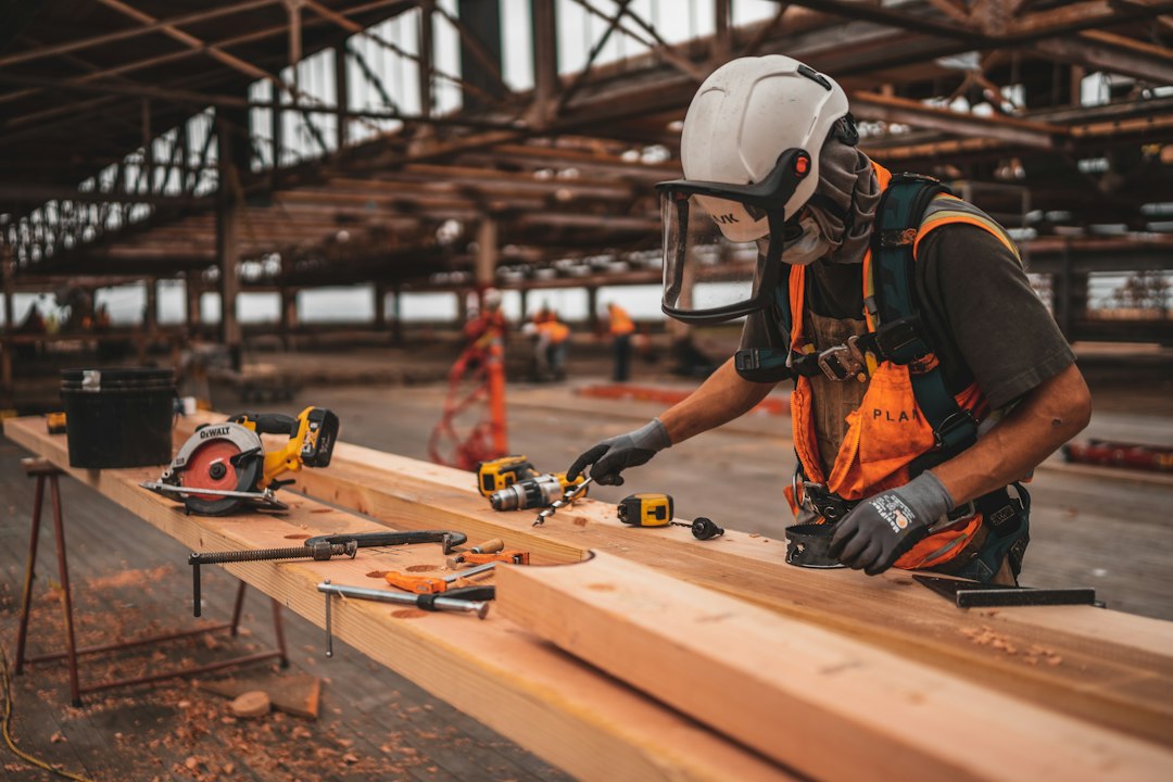 Construction worker holding a power tool