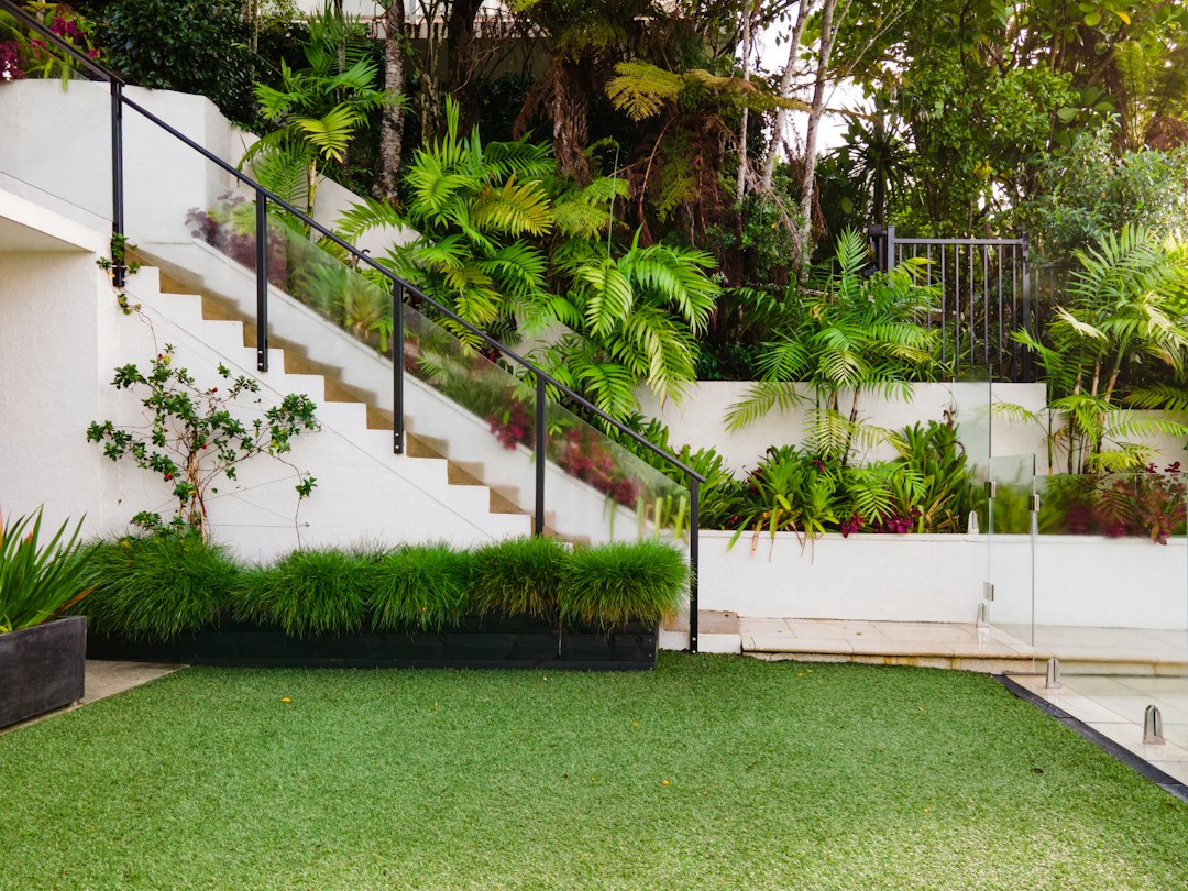 White house with a green landscaped lawn