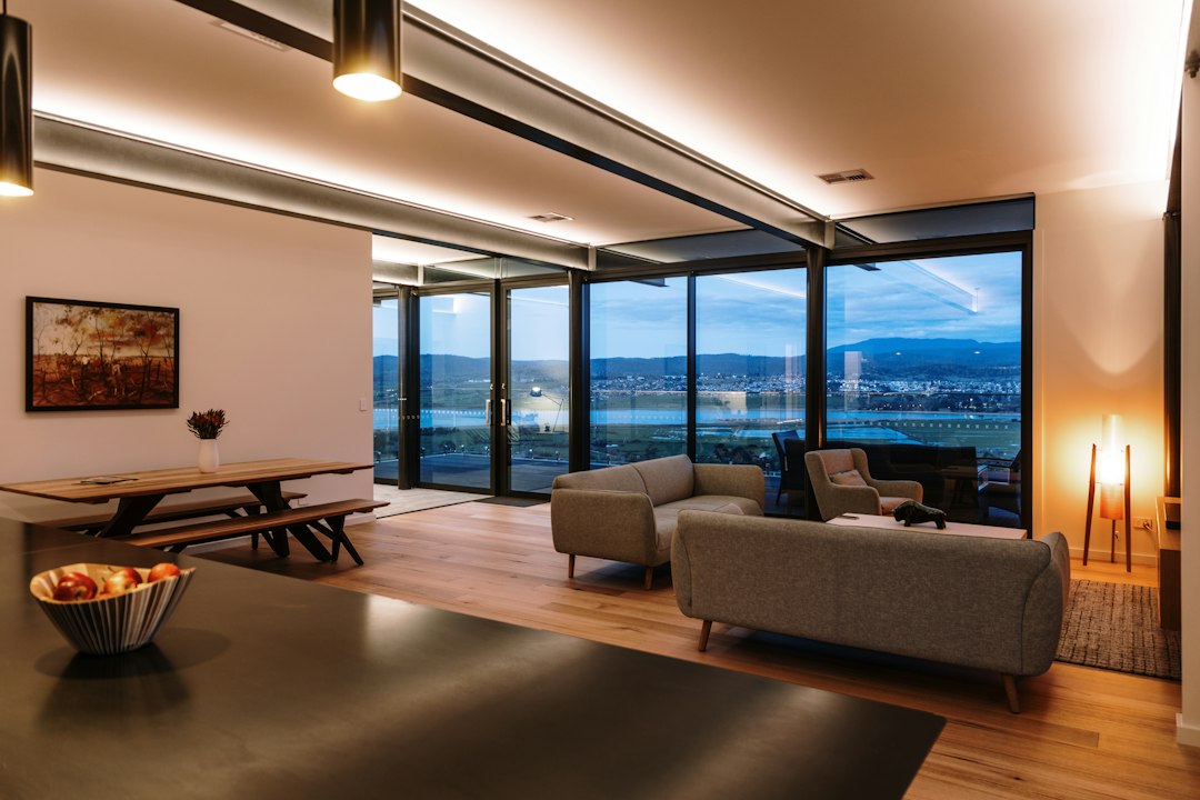 Bright living room lit by a large window