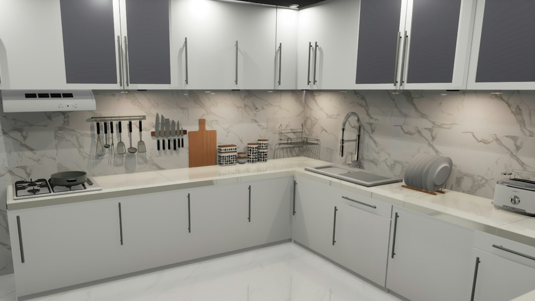 Modern kitchen with white cabinets and marble countertops